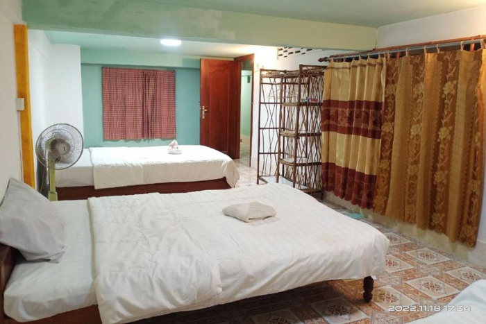 Une chambre dans le homestay local Silver Dolphin Guesthouse & Restaurant à Kratie