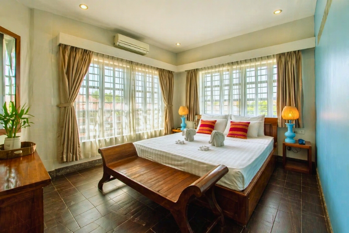 Se reposer dans une chambre pleine de caractère au Baby Elephant Boutique Hotel