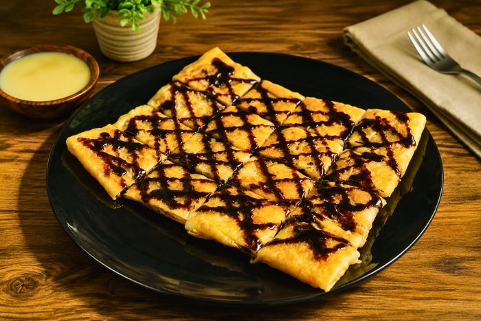 La c&eacute;l&egrave;bre cr&ecirc;pe tha&iuml;landaise Roti Phuket &agrave; la banane