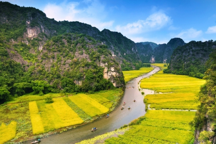 Naviguer entre les rizi&egrave;res de Tam Coc en sampan