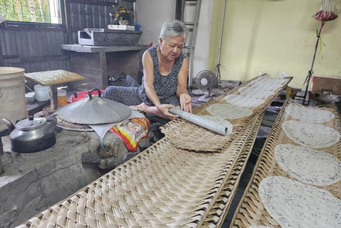 Village artisanal de galettes de riz de My Long