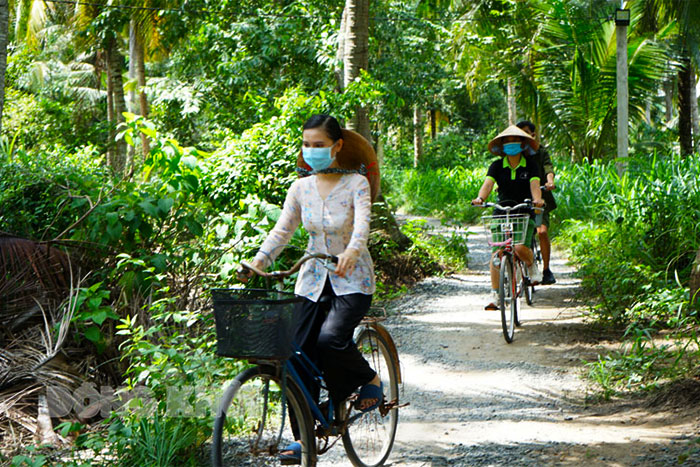 Faire du vélo pour découvrir la beauté de Ben Tre dans toute sa splendeur