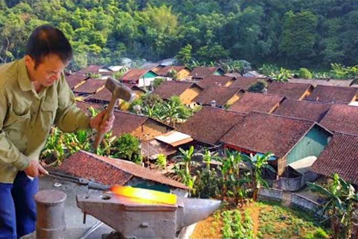 Découverte des maisons traditionnelles Nung dans le village de Pac Rang