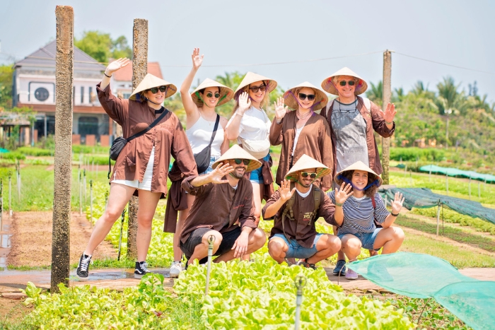 Une visite au village de Tra Que dans le circuit de 14 jours au centre Vietnam