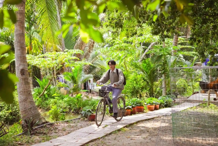 Balade à vélo sous l'ombre des cocotiers dans le Delta du Mékong
