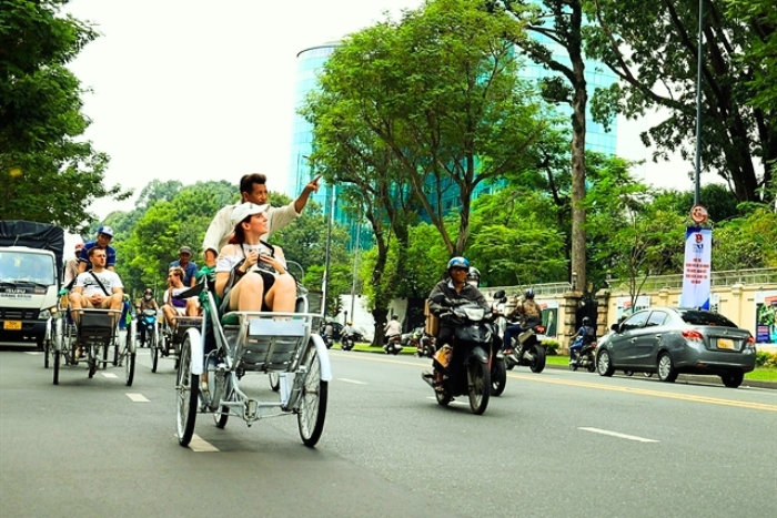 Au rythme du cyclo-pousse, la vie de Ho Chi Minh-Ville