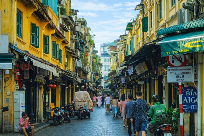 Plong&eacute;e dans la culture locale du Vieux Quartier de Hano&iuml;